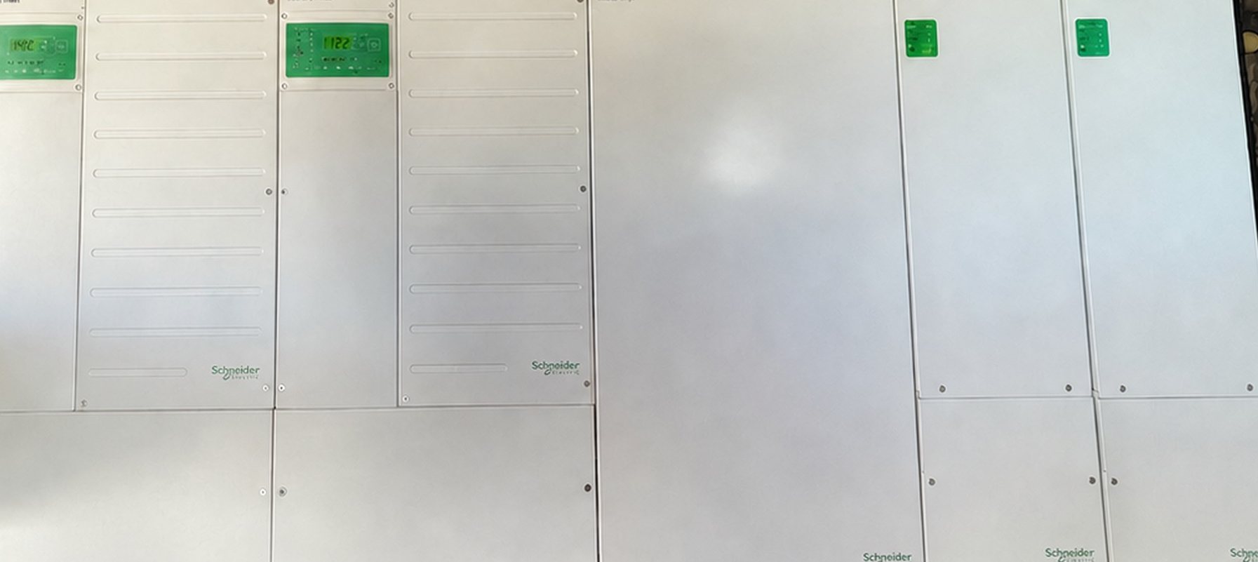 Dual Schneider XW Pro inverter/chargers and controllers mounted on the photovoltaic hut wall